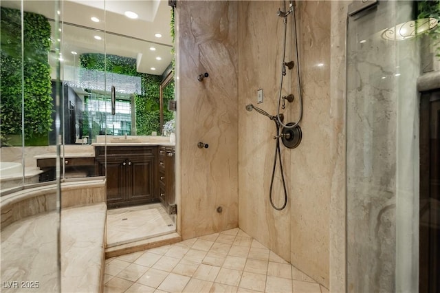 7625 Coley Ave, Las Vegas, NV 89117 - bathroom featuring vanity and a marble finish shower