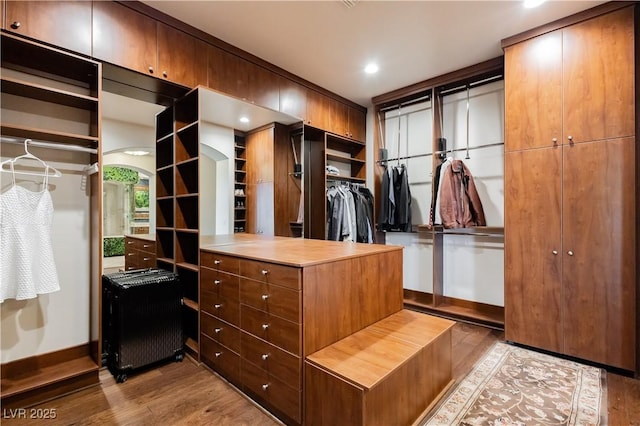 7625 Coley Ave, Las Vegas, NV 89117 - spacious closet featuring wood finished floors