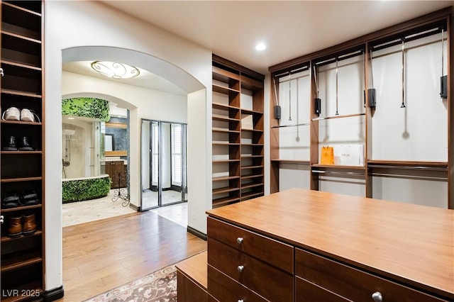 7625 Coley Ave, Las Vegas, NV 89117 - spacious closet with arched walkways and wood finished floors
