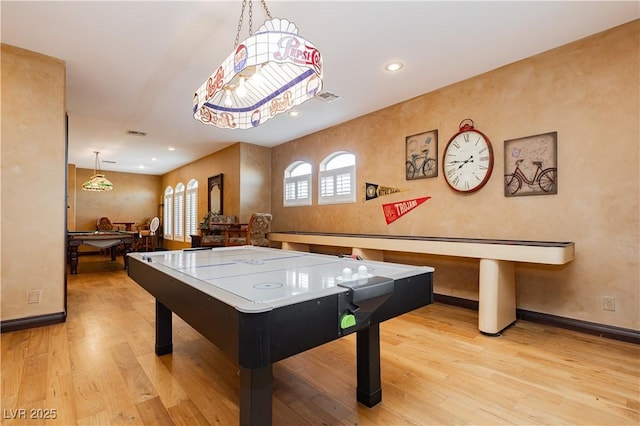 7625 Coley Ave, Las Vegas, NV 89117 - recreation room with wood finished floors, baseboards, and recessed lighting