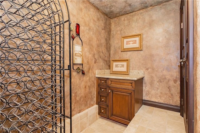 7625 Coley Ave, Las Vegas, NV 89117 - bathroom featuring tile patterned floors and baseboards