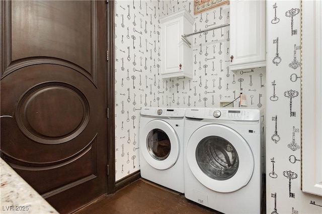 7625 Coley Ave, Las Vegas, NV 89117 - laundry room with independent washer and dryer, wallpapered walls, and cabinet space