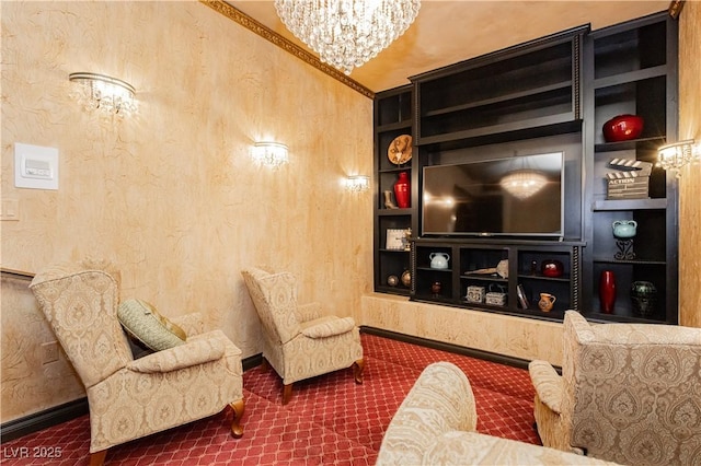 7625 Coley Ave, Las Vegas, NV 89117 - home theater room featuring dark colored carpet, a chandelier, and built in shelves
