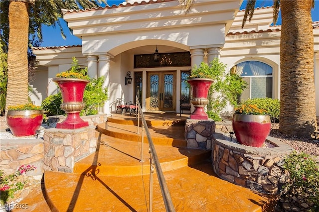 7625 Coley Ave, Las Vegas, NV 89117 - property entrance with french doors and stucco siding