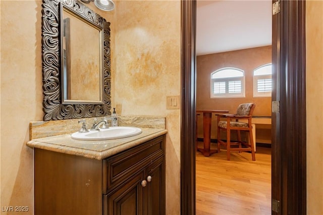 7625 Coley Ave, Las Vegas, NV 89117 - bathroom featuring vanity and wood finished floors