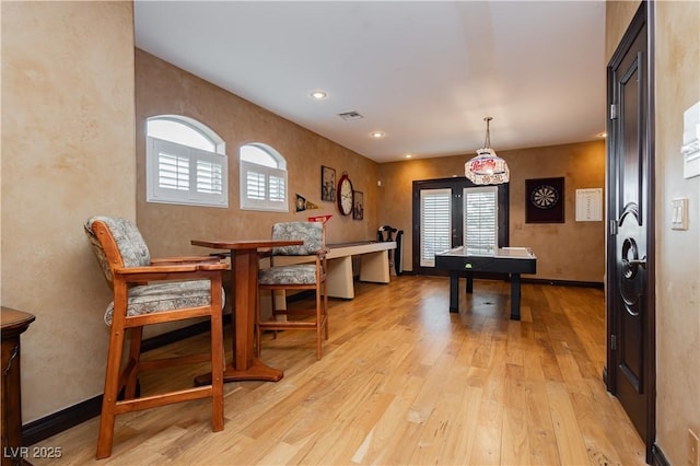 7625 Coley Ave, Las Vegas, NV 89117 - rec room with light wood finished floors and recessed lighting