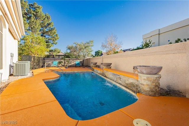 7625 Coley Ave, Las Vegas, NV 89117 - view of swimming pool featuring central AC, a fenced backyard, and a patio area