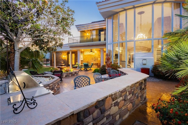 7625 Coley Ave, Las Vegas, NV 89117 - view of patio featuring a balcony, area for grilling, and a bar
