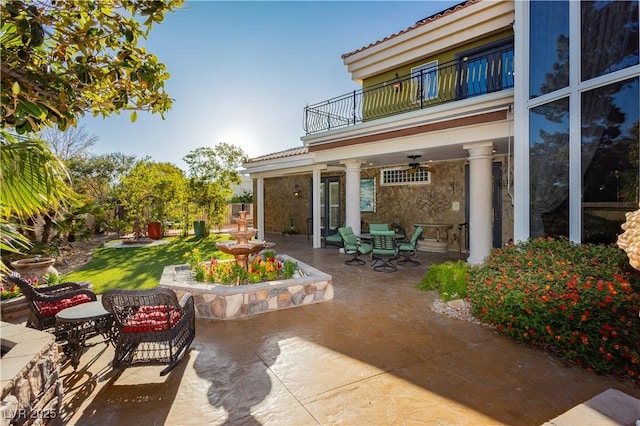 7625 Coley Ave, Las Vegas, NV 89117 - view of patio featuring a balcony and ceiling fan