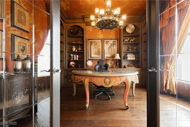 7625 Coley Ave, Las Vegas, NV 89117 - office featuring a chandelier, wood-type flooring, french doors, ornamental molding, and built in shelves
