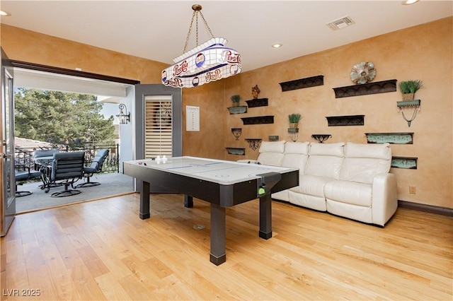 7625 Coley Ave, Las Vegas, NV 89117 - game room with wood finished floors, recessed lighting, and baseboards