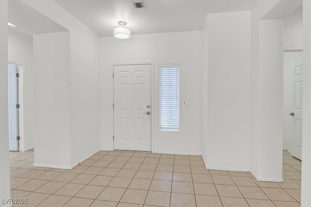 2573 Grandville Ave, Henderson, NV 89052 - foyer featuring light tile patterned floors and baseboards