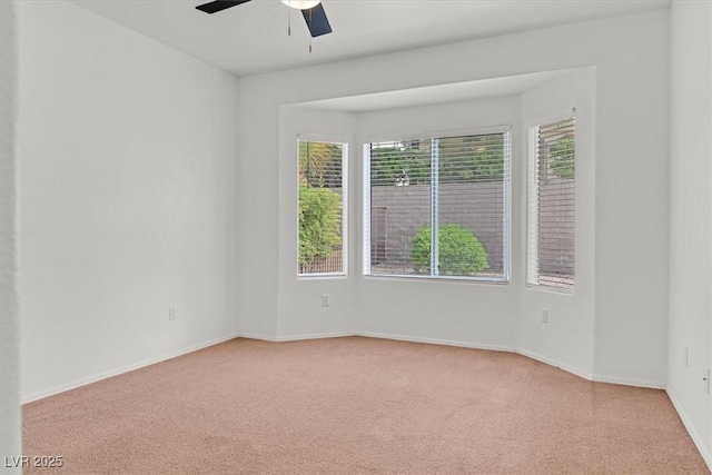 2573 Grandville Ave, Henderson, NV 89052 - spare room featuring carpet floors, a ceiling fan, and baseboards