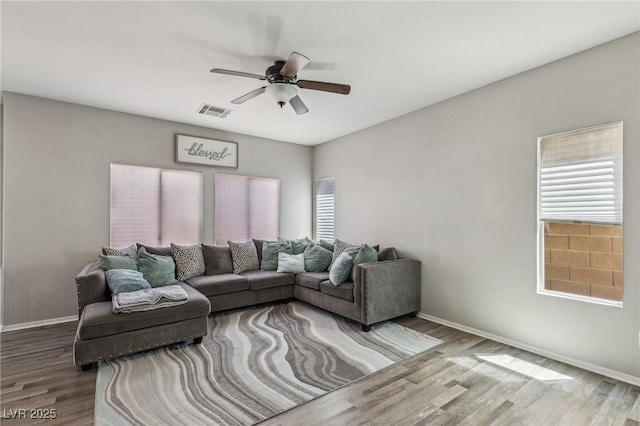 914 Appaloosa Hills Ave, North Las Vegas, NV 89081 - living room featuring wood finished floors, ceiling fan, and baseboards