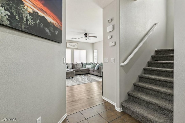 914 Appaloosa Hills Ave, North Las Vegas, NV 89081 - stairs with a ceiling fan, tile patterned floors, and baseboards
