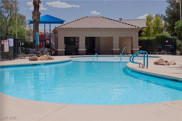 6655 Flaminian Ln Unit 104, North Las Vegas, NV 89084 - community pool with a patio