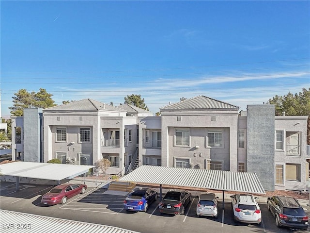2201 Ramsgate Dr Unit 327, Henderson, NV 89074 - view of property with covered and uncovered parking
