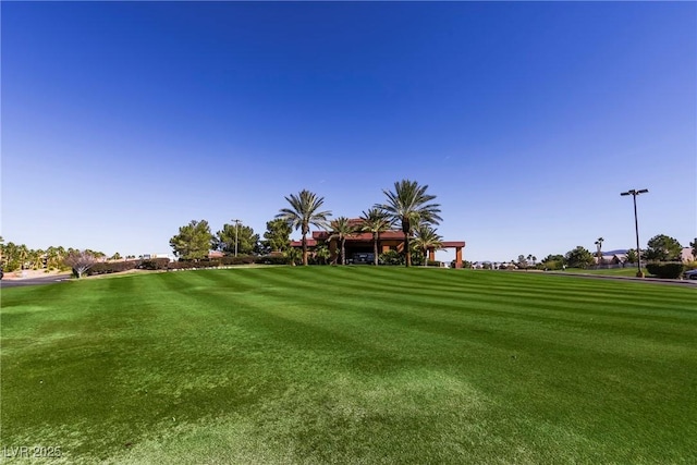 2201 Ramsgate Dr Unit 327, Henderson, NV 89074 - view of community featuring golf course view and a lawn