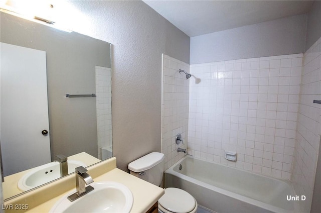 2755 Jennydiane Dr, Las Vegas, NV 89121 - full bath featuring toilet, shower / tub combination, a textured wall, and vanity