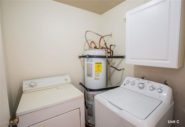 2755 Jennydiane Dr, Las Vegas, NV 89121 - washroom with cabinet space, electric water heater, and separate washer and dryer