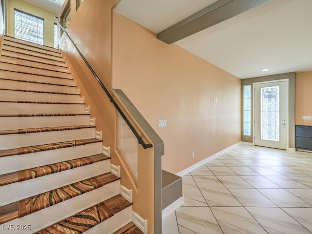6779 Goose Watch Ct, Las Vegas, NV 89139 - foyer entrance featuring plenty of natural light, stairway, light marble finish flooring, and recessed lighting