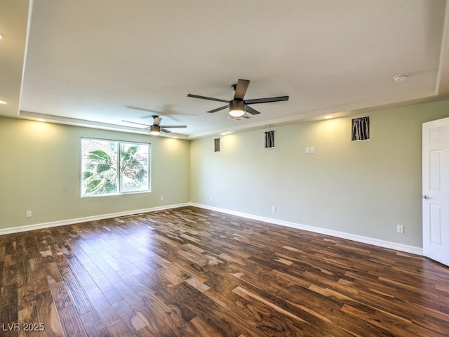 6779 Goose Watch Ct, Las Vegas, NV 89139 - unfurnished room featuring a ceiling fan, dark wood-type flooring, and a smoke detector