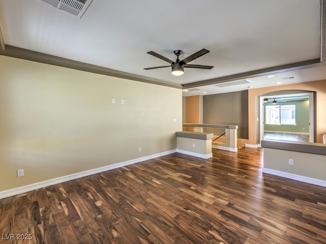 6779 Goose Watch Ct, Las Vegas, NV 89139 - spare room featuring ceiling fan, arched walkways, wood finished floors, and recessed lighting