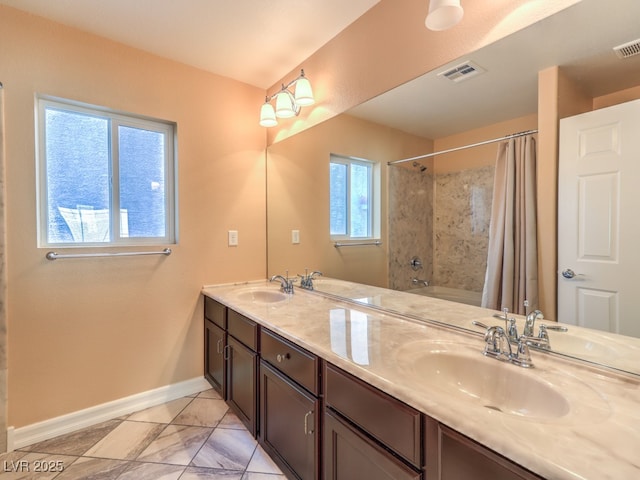6779 Goose Watch Ct, Las Vegas, NV 89139 - full bath with double vanity and shower / bath combo