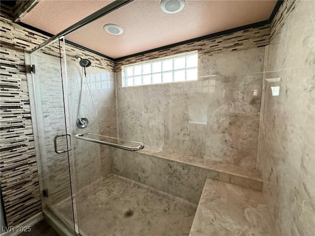 6779 Goose Watch Ct, Las Vegas, NV 89139 - full bathroom featuring a stall shower and a textured ceiling