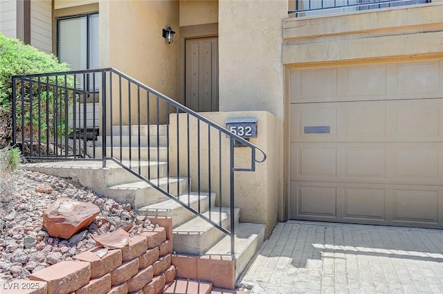 532 Greenbriar Pl, Boulder City, NV 89005 - entrance to property with stucco siding, a garage, and driveway