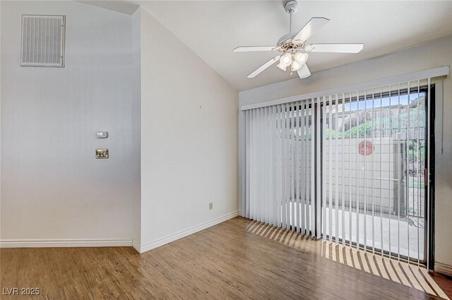 532 Greenbriar Pl, Boulder City, NV 89005 - unfurnished room with wood finished floors, baseboards, ceiling fan, and lofted ceiling