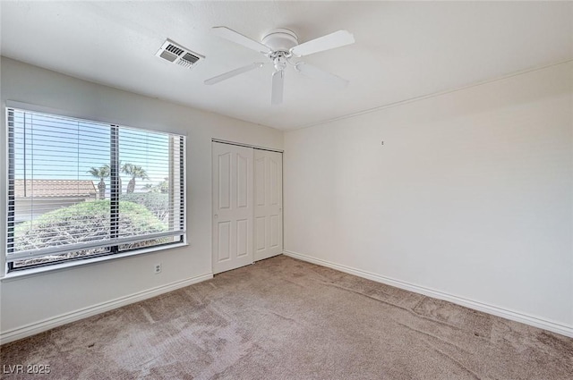 532 Greenbriar Pl, Boulder City, NV 89005 - unfurnished bedroom with carpet, baseboards, a closet, and a ceiling fan