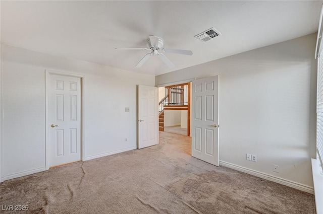 532 Greenbriar Pl, Boulder City, NV 89005 - unfurnished bedroom with light colored carpet, baseboards, and a ceiling fan
