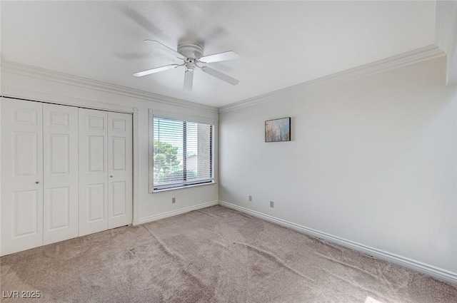 532 Greenbriar Pl, Boulder City, NV 89005 - unfurnished bedroom with ornamental molding, carpet floors, a closet, baseboards, and a ceiling fan