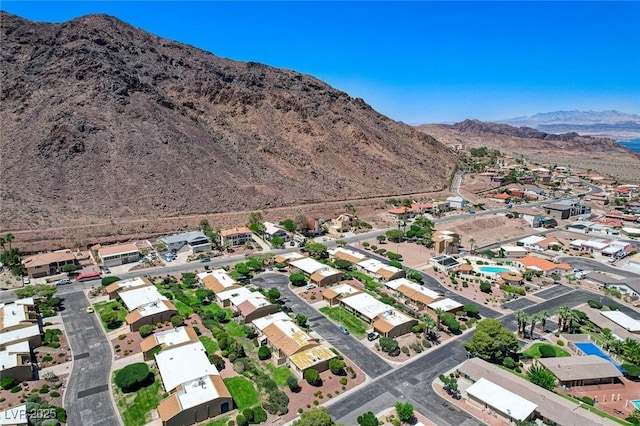 532 Greenbriar Pl, Boulder City, NV 89005 - aerial view of property's location featuring a mountain backdrop and nearby suburban area
