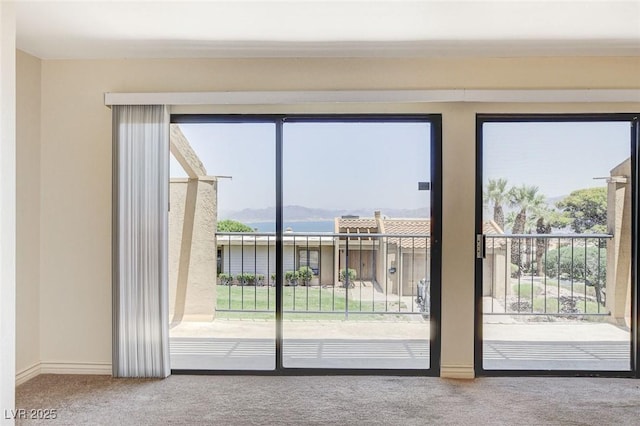532 Greenbriar Pl, Boulder City, NV 89005 - entryway with carpet and healthy amount of natural light