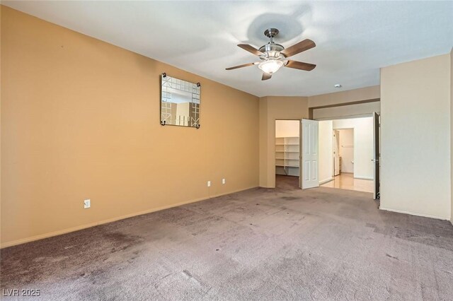 89 Autumn Day St, Henderson, NV 89012 - unfurnished bedroom with carpet flooring, baseboards, and ceiling fan