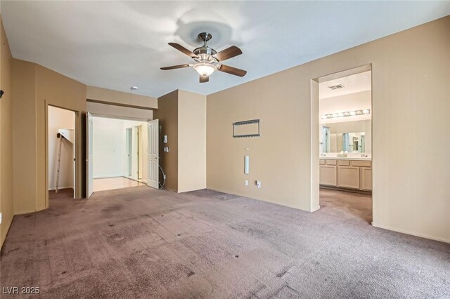 89 Autumn Day St, Henderson, NV 89012 - unfurnished bedroom featuring carpet floors, ensuite bath, ceiling fan, and baseboards