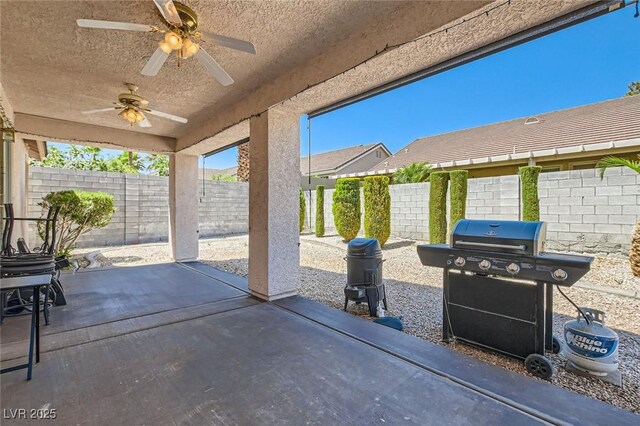 89 Autumn Day St, Henderson, NV 89012 - fenced backyard featuring ceiling fan, a patio area, and grilling area