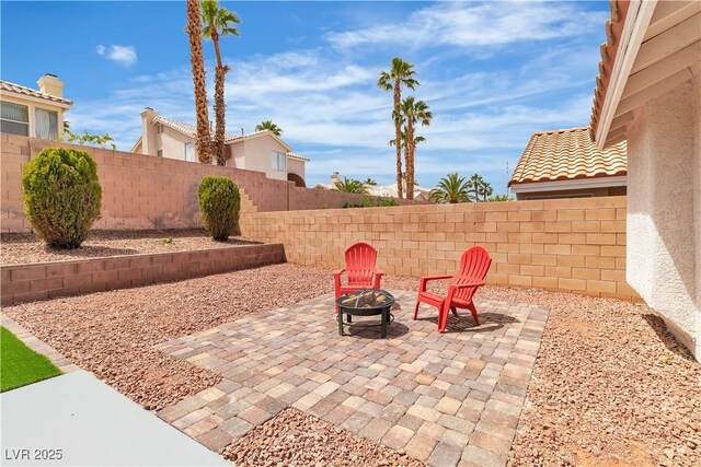 3109 Siena Cir, Las Vegas, NV 89128 - view of patio / terrace featuring a fire pit
