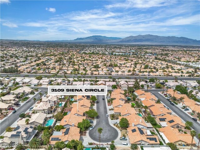 3109 Siena Cir, Las Vegas, NV 89128 - aerial view of property's location with nearby suburban area and a mountainous background