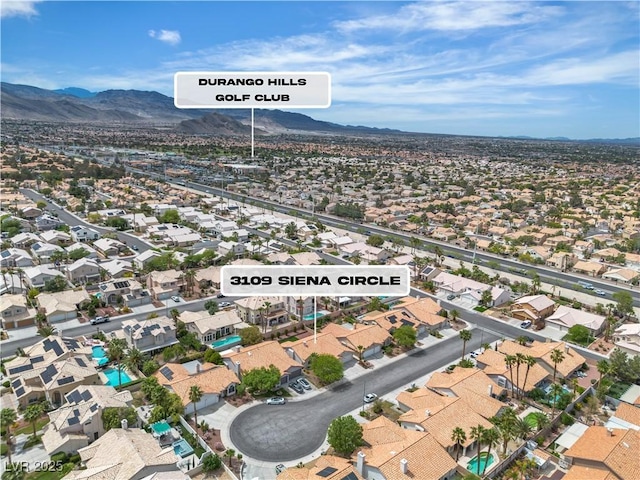 3109 Siena Cir, Las Vegas, NV 89128 - aerial perspective of suburban area with a mountain backdrop