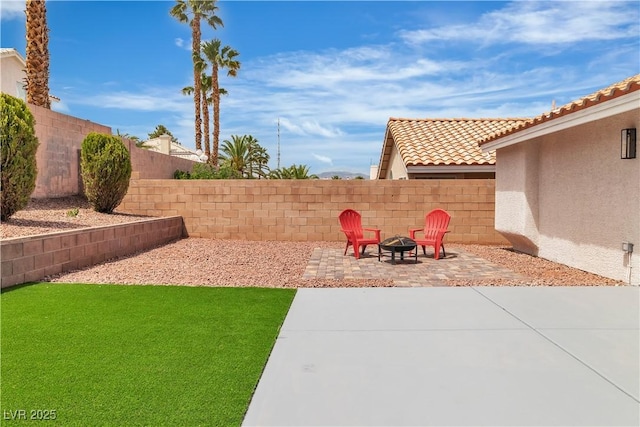 3109 Siena Cir, Las Vegas, NV 89128 - fenced backyard featuring a fire pit and a patio area