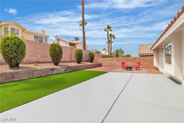 3109 Siena Cir, Las Vegas, NV 89128 - fenced backyard featuring a patio area