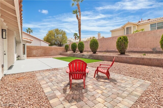 3109 Siena Cir, Las Vegas, NV 89128 - fenced backyard featuring a patio area