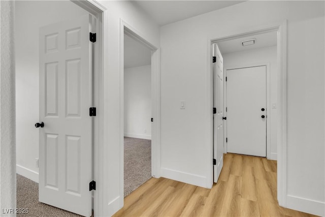 3109 Siena Cir, Las Vegas, NV 89128 - hall featuring light wood-type flooring and baseboards