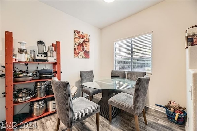2110 Los Feliz St Unit 1066, Las Vegas, NV 89156 - dining area with wood finished floors and baseboards