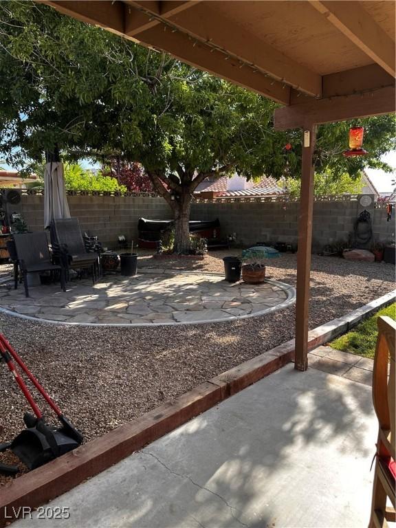 5020 Wildroot Rd, Las Vegas, NV 89130 - fenced backyard featuring a patio