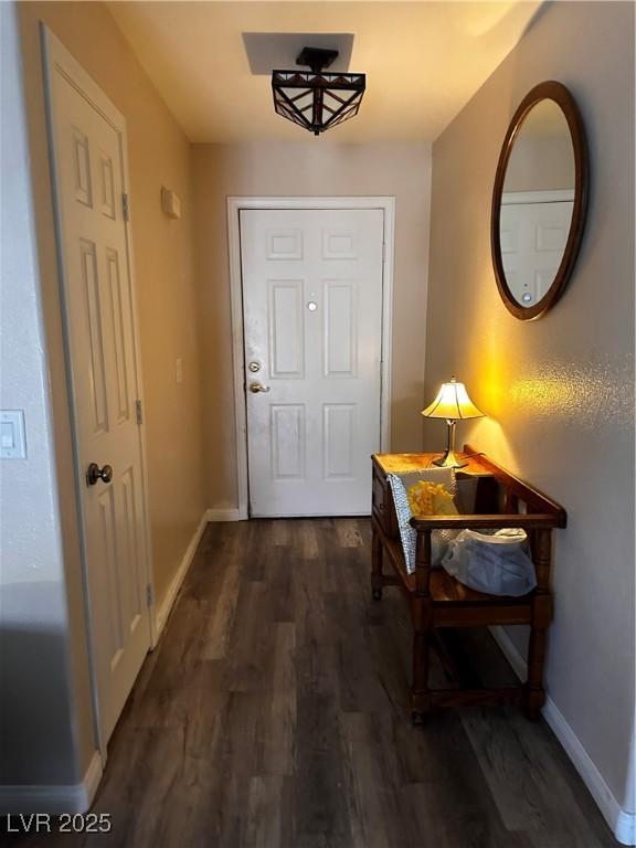 5020 Wildroot Rd, Las Vegas, NV 89130 - entryway with dark wood-style flooring and baseboards