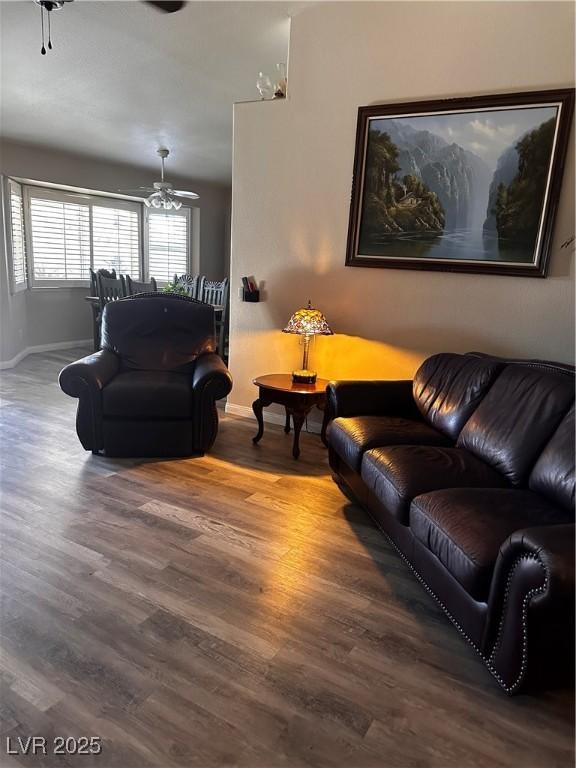 5020 Wildroot Rd, Las Vegas, NV 89130 - living room featuring wood finished floors and a ceiling fan